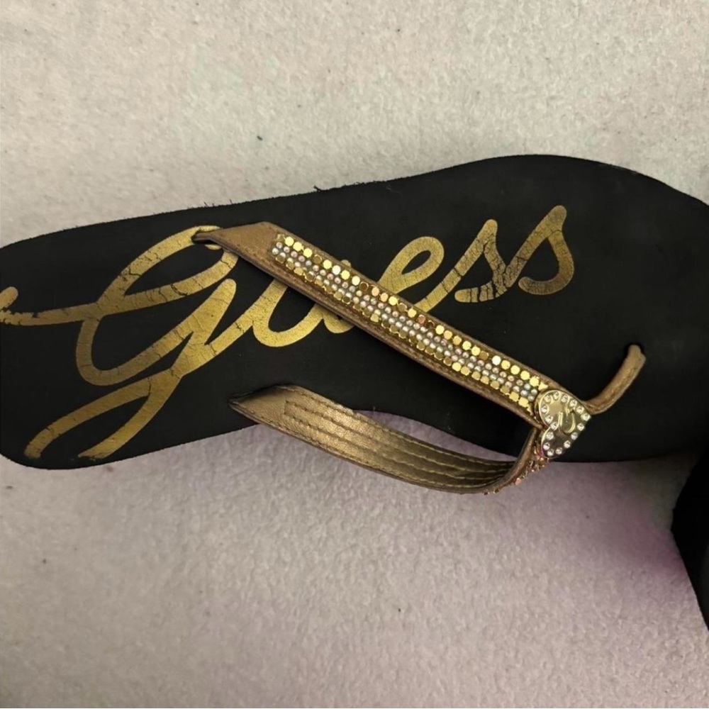 Guess Black and Gold Sandals with Chic Design